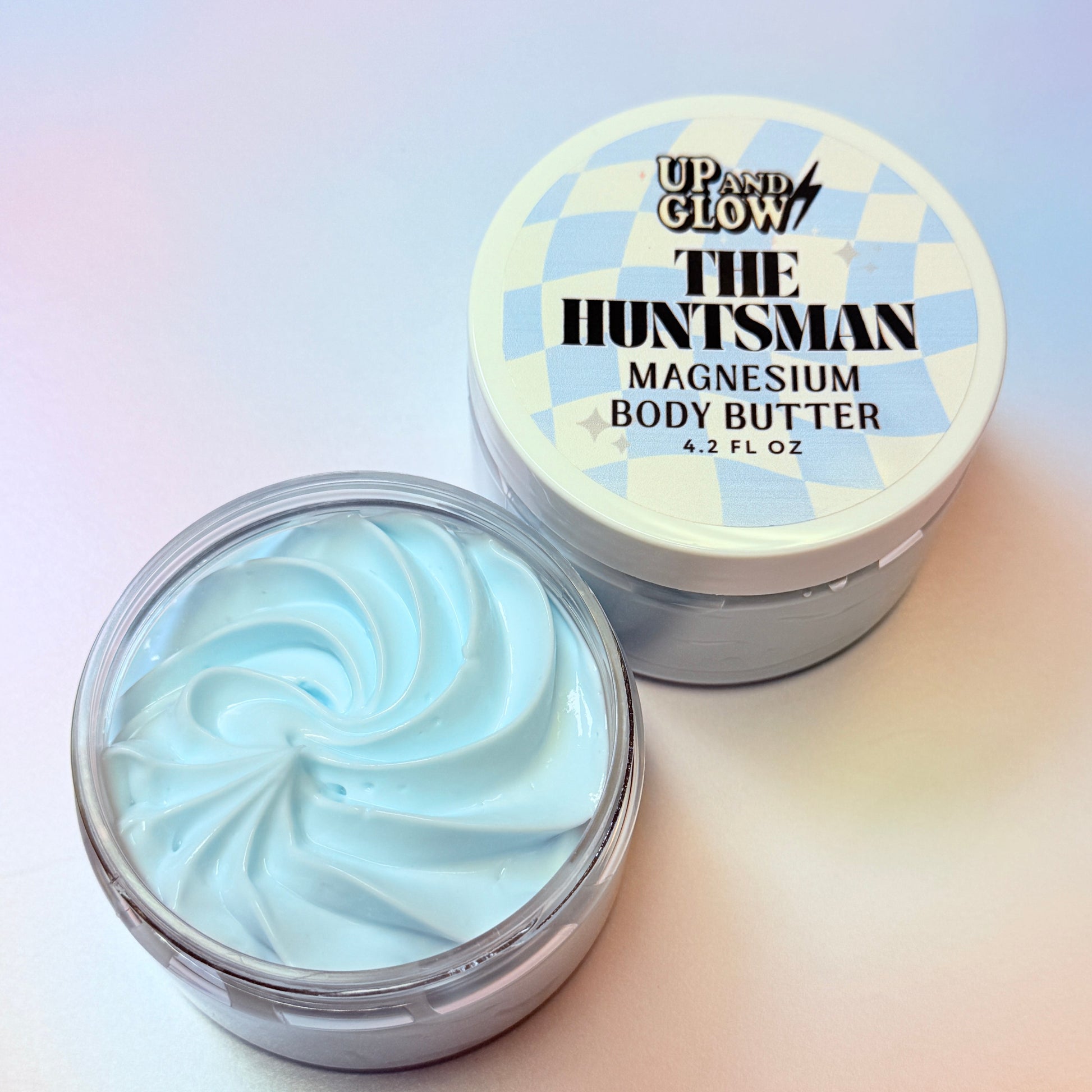 Body butter container with visible brand name on a gradient background